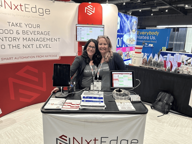 The NxtEdge team at a hospitality industry trade show booth