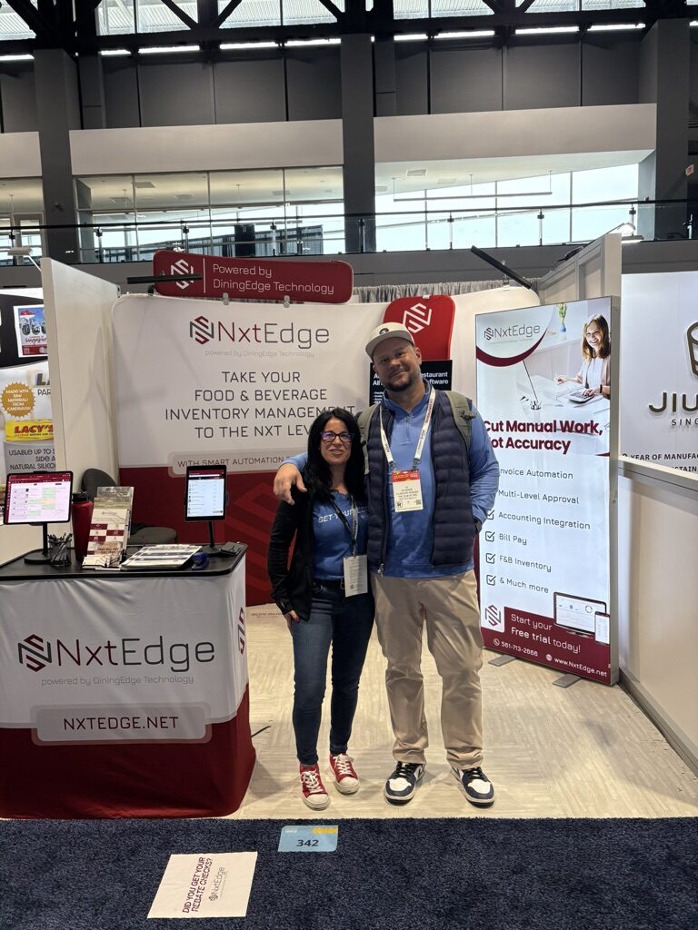 NxtEdge welcoming a hospitality operator at its National Restaurant Association Show booth