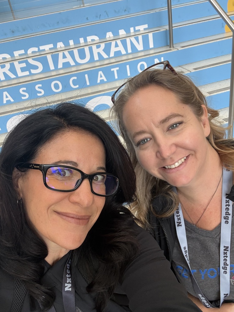 NxtEdge team at the National Restaurant Association Show entrance